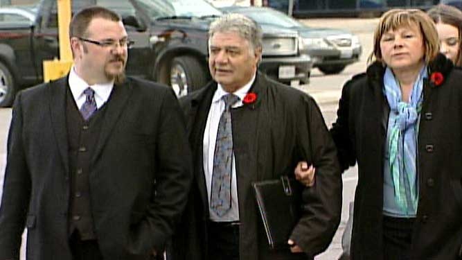 Mayor Joe Fontana, centre, arrives at the courthouse in London, Ont. on Monday, Oct. 28, 2013.
