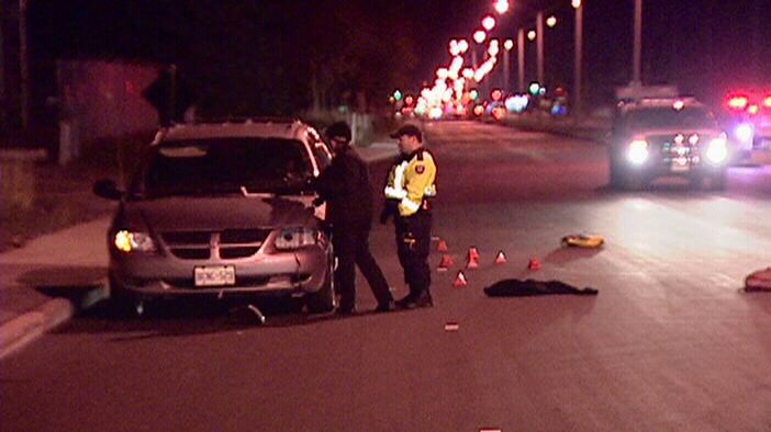 Police investigate the scene a collision on Eagleson Road near Hazeldean Road where a 17-year-old girl was struck by a vehicle Tuesday, Oct. 29, 2013.