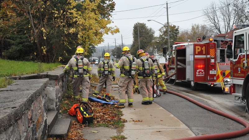 Fire crews are seen at a house fire on Water Street in Penetanguishene Oct. 30, 2013. (Peter King / CTV Viewer)