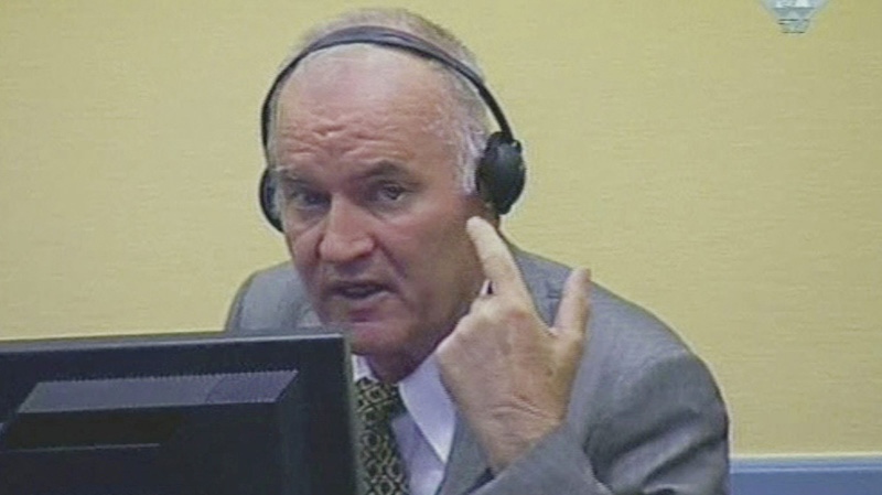 In this image taken from TV former Bosnian Serb military chief Ratko Mladic sits in the court room during his further initial appearance at the UN's Yugoslav war crimes tribunal in The Hague, Netherlands, Monday, July 4, 2011. (AP Photo/ICTY via APTN)