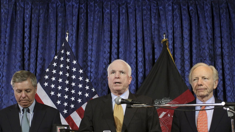 U.S. Senator John McCain, R-Ariz, center, speaks as other U.S. Senators Joe Lieberman, I-Conn, right, and Lindsay Graham, R-SC, are seen with him during a press conference in Kabul, Afghanistan on Sunday, July 3, 2011. (AP / Musadeq Sadeq)