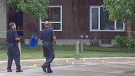 Police investigate the shooting on Taft Crescent on Monday Morning.