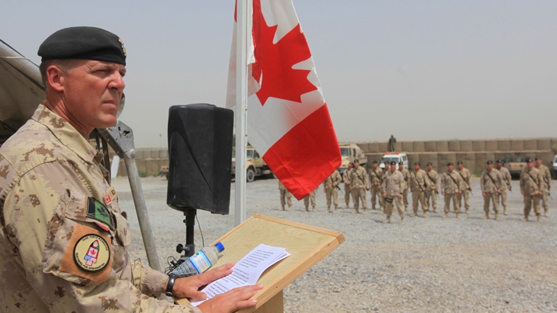 Brig.-Gen Dean Milner speaks during a ceremony marking the Canadian handover of forward fire base Masum Ghar to U.S. forces in Panjwaii district in Kandahar province southern Afghanistan, Tuesday, July 5, 2011. (AP / Rafiq Maqbool)