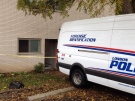 The London Police Service Forensic Identification team is at the scene where three bodies were found in an apartment on Richmond Street in London, Ont. on Thursday, Oct. 31, 2013. (Daryl Newcombe / CTV London)