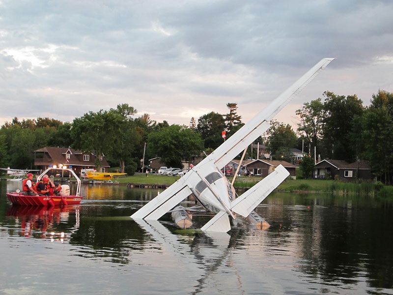 A float plane is partially submerged in the water after a failed landing on Constance Lake in west Ottawa, Tuesday, July 5, 2011. Courtesy: Ottawa Fire Services