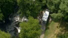 Emergency crews arrive at the scene of a reported drowning in Highland Creek, Wednesday, July 6, 2011.