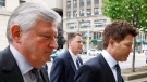 Dr. Anthony Galea, right, arrives at federal court with his attorney Brian Greenspan, left, for a plea hearing in Buffalo, N.Y., Wednesday, July 6, 2011. (AP / David Duprey)