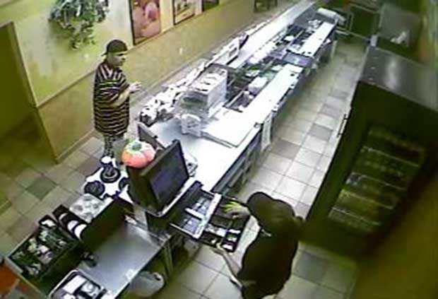 The Windsor Police Service has released this image of a man wanted in connection with a robbery at the Subway Restaurant at 7847 Tecumseh Road East on Wednesday, Oct. 16, 2013.