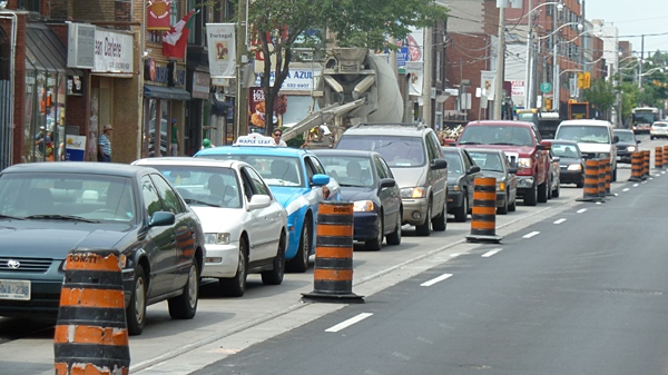 Traffic is down to one lane on Dundas Street West as construction crews work to rebuild sidewalks on Thursday, July 7, 2011. (Bill Doskoch/CTV News)
