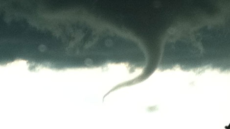 A funnel cloud is pictured east of Sundre, Alta. on Thursday, July 7, 2011. Image: Mike Crone.
