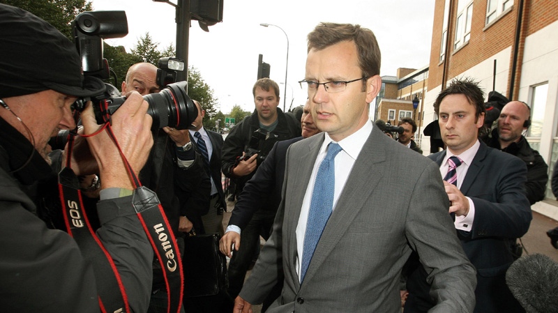 Former Downing Street communication chief Andy Coulson surrounded by media as he leaves Lewisham police station in south London, after being arrested in a phone hacking and police corruption scandal, Friday July 8, 2011. (AP / PA, Dominic Lipinski) 