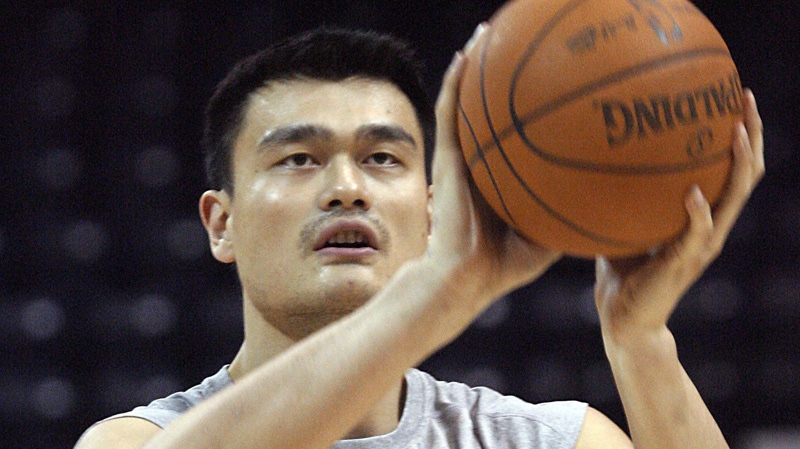 In this Oct. 2010 file photo, the Houston Rockets' Yao Ming warms up for a preseason game in Hidalgo, Texas (AP Photo/Delcia Lopez)