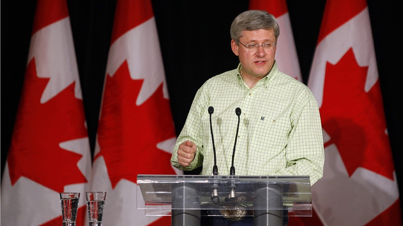 Prime Minister Stephen Harper, delivers a speech at his annual riding association barbecue at Heritage Park in Calgary, Alta., Saturday, July 9, 2011.