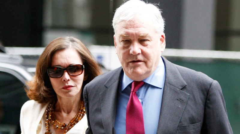 Conrad Black arrives at Federal Courthouse with his wife Barbara Amiel, Friday, June 24, 2011 in Chicago. Black, 66, once one of the world's most powerful media moguls, will appear in court for his re-sentencing hearing on two fraud convictions, where a judge will decide whether he heads back behind bars or remains free for good. (AP / Kiichiro Sato)