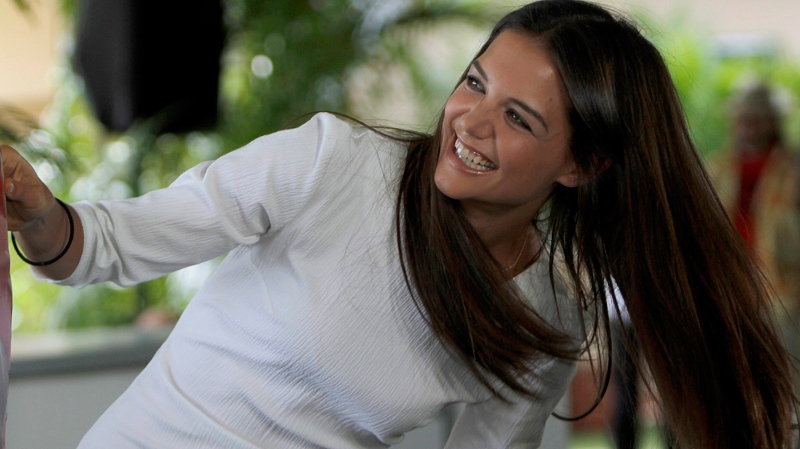 Actress Katie Holmes poses for photographers during a media event to promote her new movie 'Jack and Jill' in Cancun, Mexico, Sunday, July 10, 2011. (AP / Marco Ugarte)