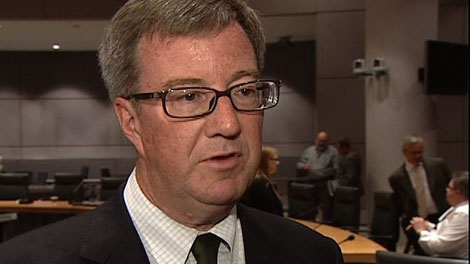 Ottawa Mayor Jim Watson talks to reporters about the city's light rail plan, Wednesday, July 13, 2011.