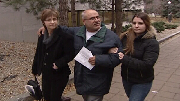 Nidal Zeiti, 52, with his wife and daughter, leaves Ottawa court free on bail