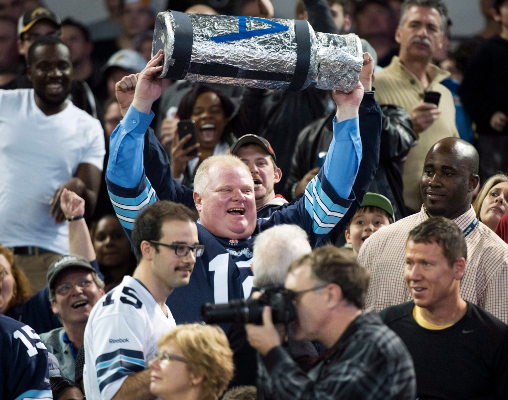 Rob Ford holding Grey Cup