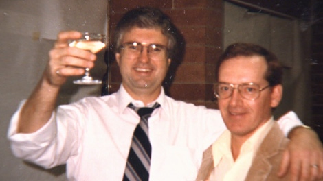 Chuck Gale, left, poses with Douglas Archie Clark, who faces 13 counts of fraud from more than 40 victims, in this undated photo. (CTV)