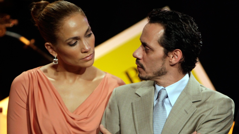 Jennifer Lopez and Marc Anthony attend a signing ceremony for filmmaking incentive legislation for the U.S. island territory in Bayamon, Puerto Rico, March 4, 2011. (AP / Ricardo Arduengo)