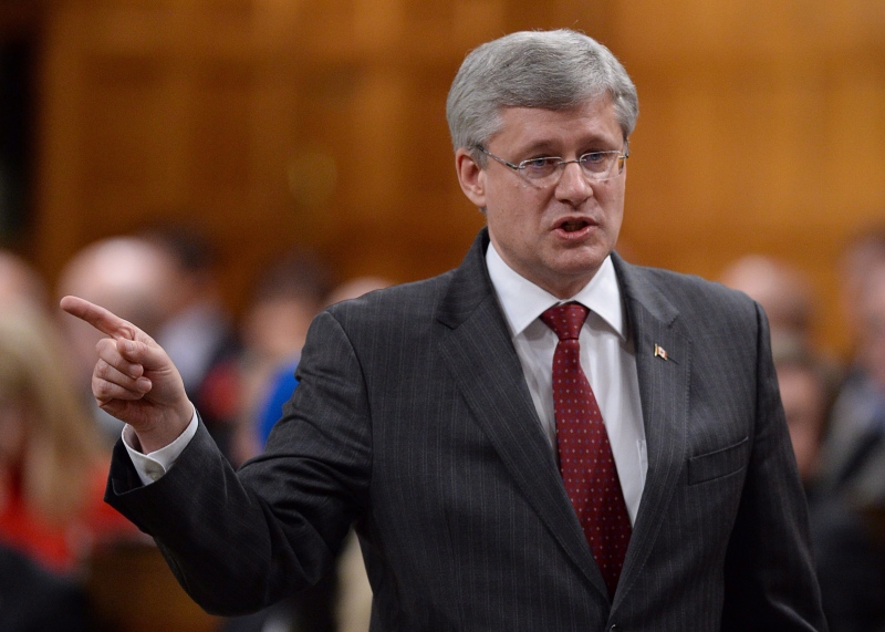 Prime Minister Stephen Harper responds to a question during question period in the House of Commons on Parliament Hill in Ottawa on Wednesday, Nov. 20, 2013. (Sean Kilpatrick / THE CANADIAN PRESS)