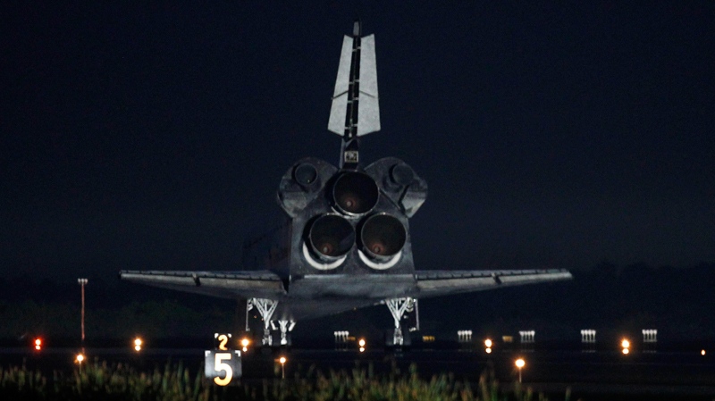 Space shuttle Atlantis comes to a complete stop at the Kennedy Space Center landing strip at Cape Canaveral, Fla. Thursday, July 21, 2011. The landing of Atlantis marks the end of NASA's 30 year space shuttle program. (AP / Terry Renna)