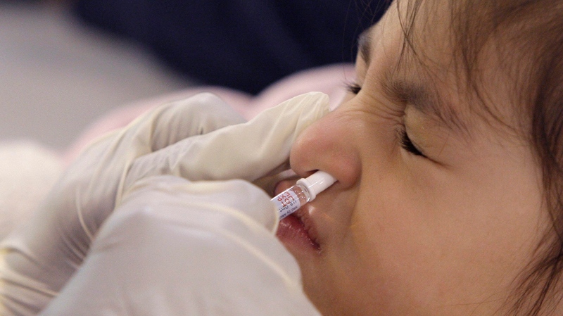 Needleless flu mist vaccine
