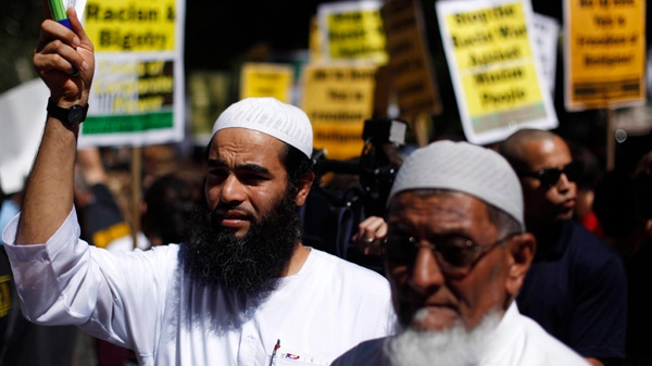 Sultan Ahmed, left, and Mohammed Sadik participate in a demonstration in support of the proposed site for an Islamic cultural centre near ground zero, in New York, Saturday, Sept. 11, 2010. (AP / Matt Rourke)