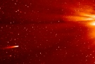 In this frame grab taken from enhanced video made by NASA's STEREO-A spacecraft, comet ISON, left, approaches the sun on Nov. 25, 2013. Comet Encke is shown just below ISON. (NASA)
