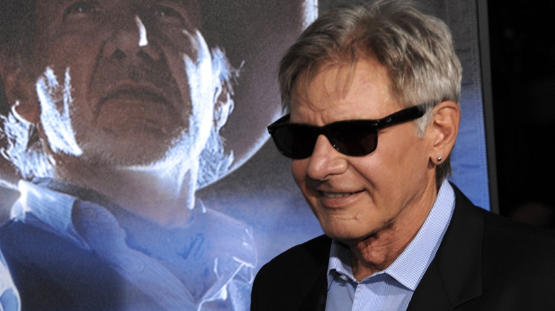 Actor Harrison Ford arrives at the premiere of the feature film "Cowboys and Aliens" at Comic Con in San Diego, Calif. on Saturday, July 23, 2011.