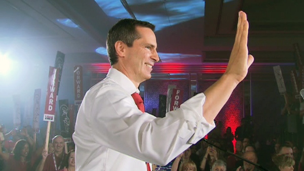 Ontario Premier Dalton McGuinty waves to supporters at a Liberal Rally in Richmond Hill, Ont., Sunday, June 24, 2011.