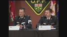 OPP Insp. Dwight Peer, left, and OPP Insp. Brad Fishleigh speak at a press conference in London, Ont. on Monday, Dec. 2, 2013. (Cristina Howorun / CTV London)