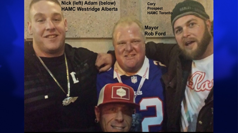 In this photo from the Hells Angels Toronto website, Toronto Mayor Rob Ford is pictured with two men who are identified as being members of the Hells Angels and one man who is identified as being a prospect of the Hells Angels in Toronto, Dec. 1, 2013. 