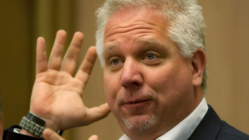 Radio talk show host and former Fox News Channel personality Glenn Beck gestures as he speaks in Jerusalem on July 11, 2011. Beck said on his Monday, July 26, 2011 radio show that the camp in Norway where a gunman opened fire on young people sounds 'like Hitler Youth.' (AP / Sebastian Scheiner)