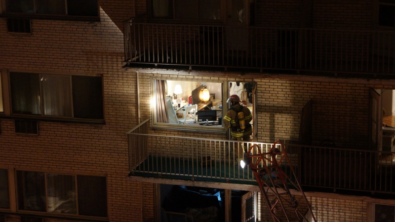 A firefighter inspects an apartment after a fire occurred one floor below on Dec. 3, 2013. (Photo: MyNews user Chimène Bejjani)