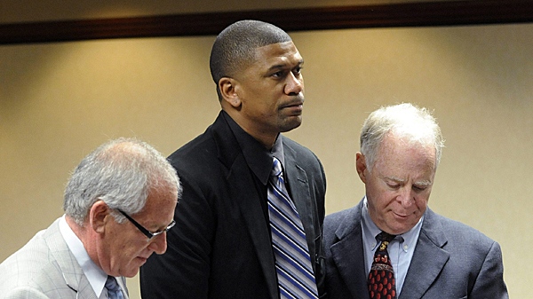 Jalen Rose, centre, appears in court on Wednesday, May 25, 2011, in Bloomfield Hills, Mich. (AP Photo/The Detroit News, Charles V. Tines)