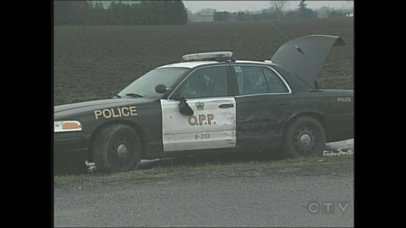 A damaged OPP cruiser is seen following a police chase that began in St. Thomas and ended in Elgin County, Ont. on Thursday, Dec. 5, 2013. (Justin Zadorsky / CTV London)