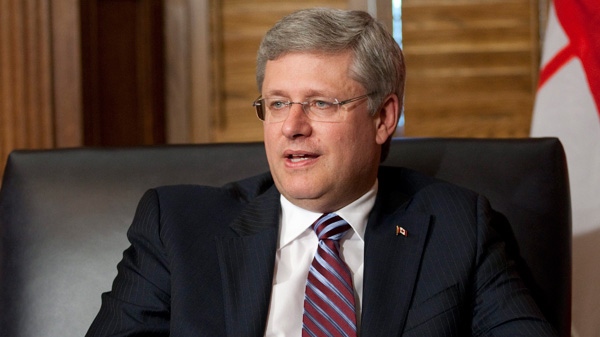 Prime Minister Stephen Harper is seen in his office on Parliament Hill in Ottawa, Thursday July 28, 2011. (Adrian Wyld / THE CANADIAN PRESS)