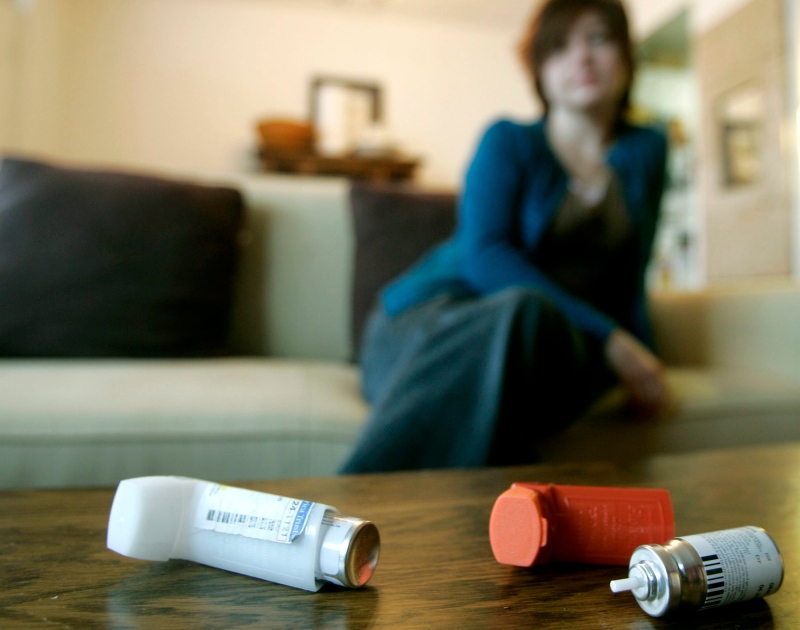 Asthma inhalers are shown on a table in this 2006 file photo. (Nathan Denette/THE CANADIAN PRESS)