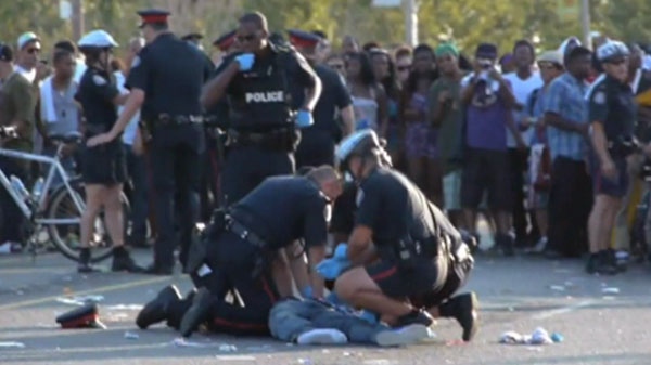 A shooting incident at the Scotiabank Toronto Caribbean Carnival parade involving the Toronto Police, left one man dead and two other people with gunshot wounds, Saturday, July 30, 2011.