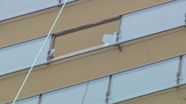 A panel of glass fell from a high-rise on Grosvenor Street in downtown Toronto on Monday, August 1, 2011. 
