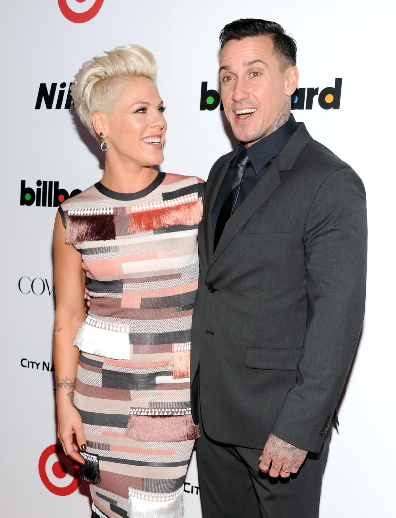 Singer Pink, the Woman of the Year, honoree arrives with her husband Carey Hart at the Billboard Women In Music Awards at Capitale on Tuesday, Dec. 10, 2013 in New York. (Photo by Evan Agostini/Invision/AP)