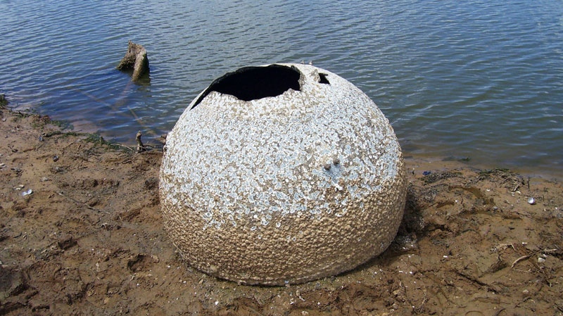 This Aug. 1, 2011 handout photo provided by the Nacogdoches Police Department shows a 4-feet in diameter sphere found in Lake Nacogdoches, Texas on Monday, Aug. 1. (AP Photo/Nacogdoches Police Department)