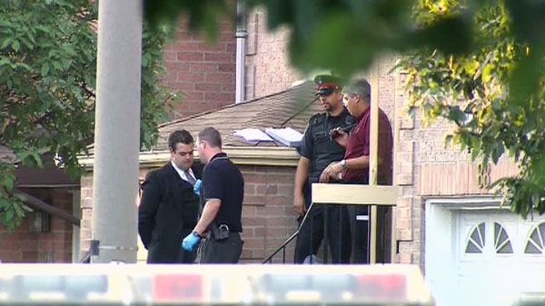 Special Investigations Unit investigates after two people were killed in Thornhill, Monday, Aug. 1, 2011.