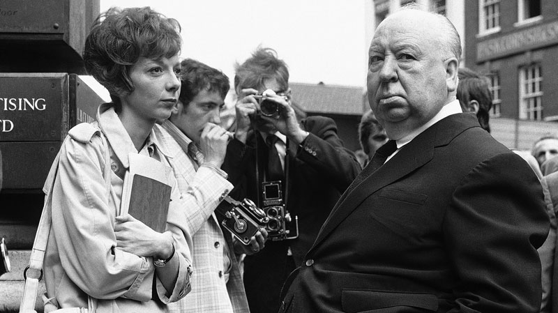  In this July 26, 1971 file photo, British film producer and director Alfred Hitchcock, right, discusses filming with actress Anna Massey, one of the stars of "Frenzy", in Covent Garden Market, London. (AP / Leonard Brown, file)