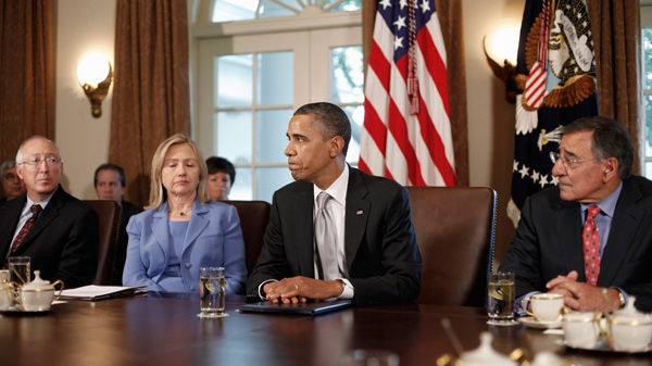 President Barack Obama speaks to members of the media during a Cabinet meeting in the Cabinet Room of the White House in Washington, Wednesday, Aug., 3, 2011. From left are, Interior Secretary Ken Salazar, Secretary of State Hillary Rodham Clinton, the president, and Defense Secretary Leon Panetta. (AP / Pablo Martinez Monsivais)