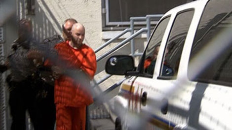 David Wesley Bobbitt is escorted to a police vehicle outside a courthouse in Penticton, B.C. on Thursday, Aug. 4, 2011. (CTV)