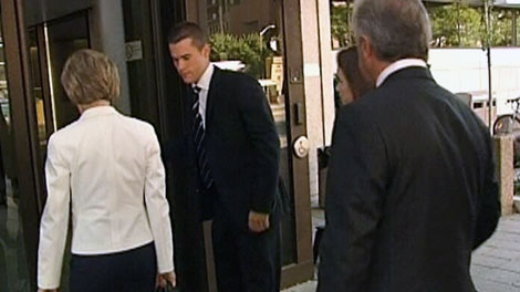Jack Tobin, middle, arrives at an Ottawa court with his mother, Jodean, and father, former Newfoundland premier Brian Tobin, in Ottawa on Friday, Aug. 5, 2011. 