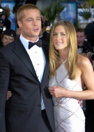 Brad Pitt arrives with Jennifer Aniston for the screening of his film 'Troy,' at the 57th International Film Festival in Cannes, southern France, May 13, 2004. (AP / Patrick Gardin)