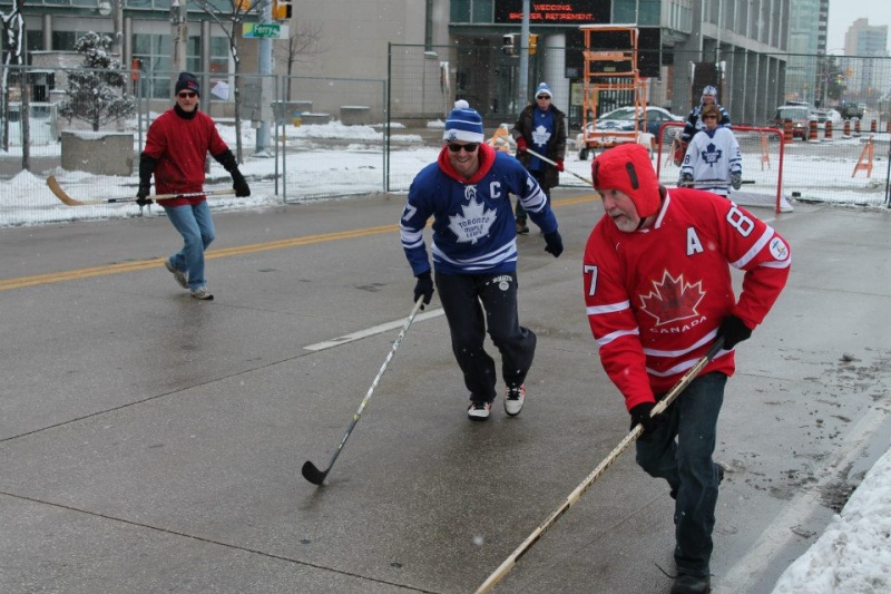Players hit the pavement on Riverside Drive, during the 2012 Windsor Classic hockey game. (The Windsor Classic)